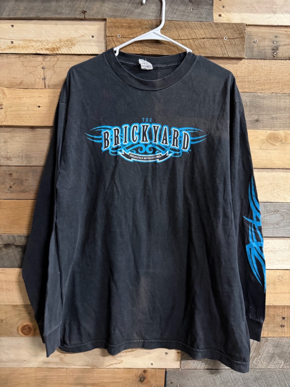 The Brickyard Long Sleeve Graphic Tee - Black with Blue Logo